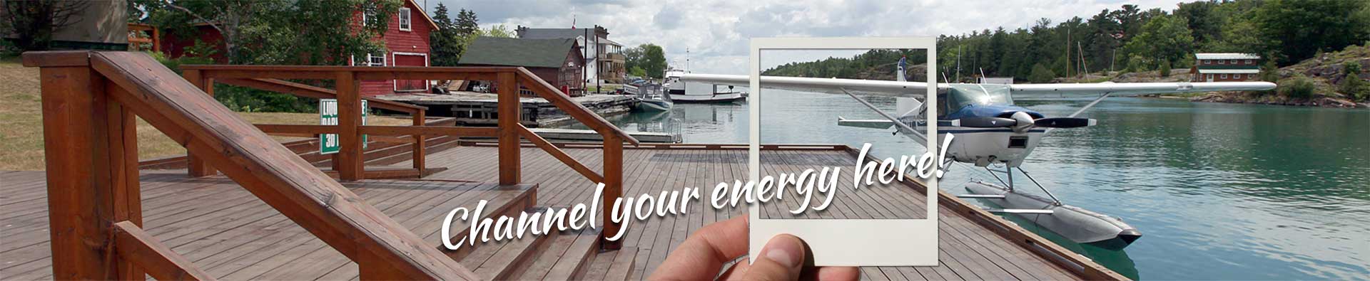 Header image of Killarney's water front with a poloroid photo frame superimposed and a slogan 'Channel your energy here.' over it.